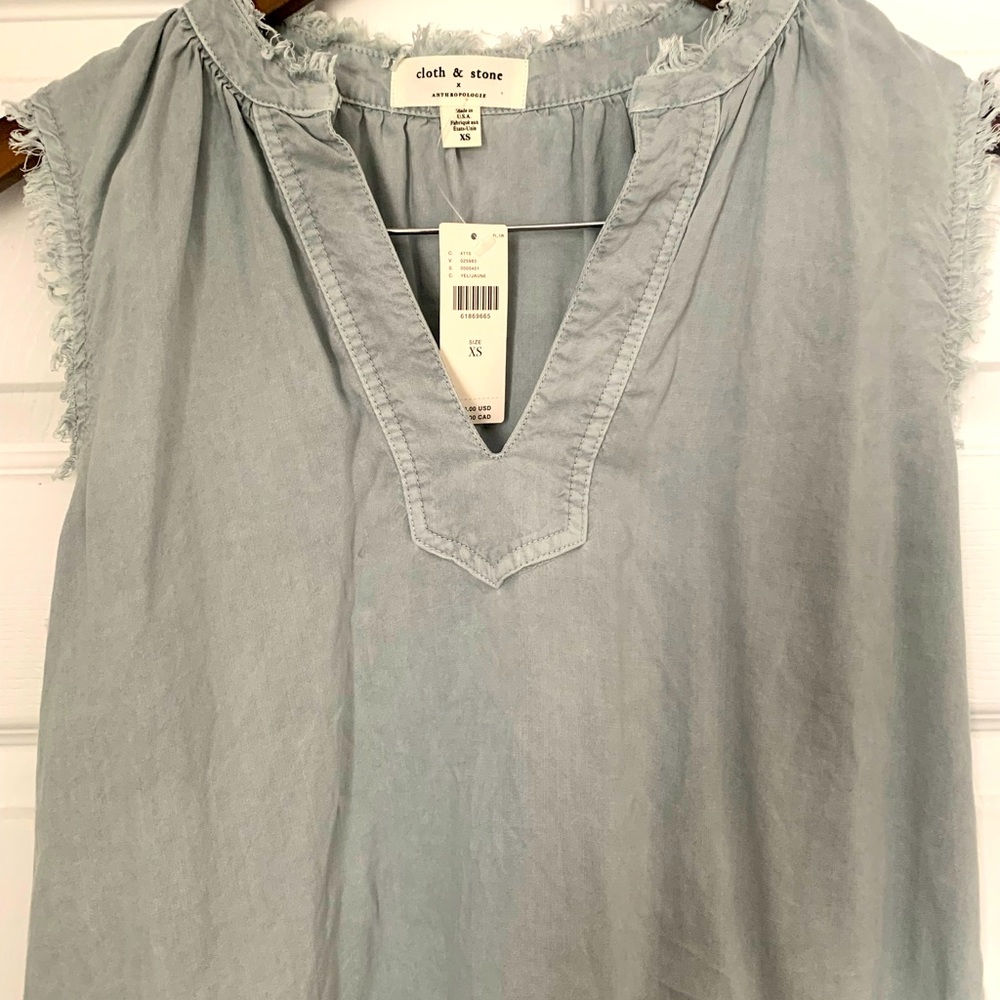 Cloth and stone tank with flattering neckline. Frayed shoulder detail. NWT